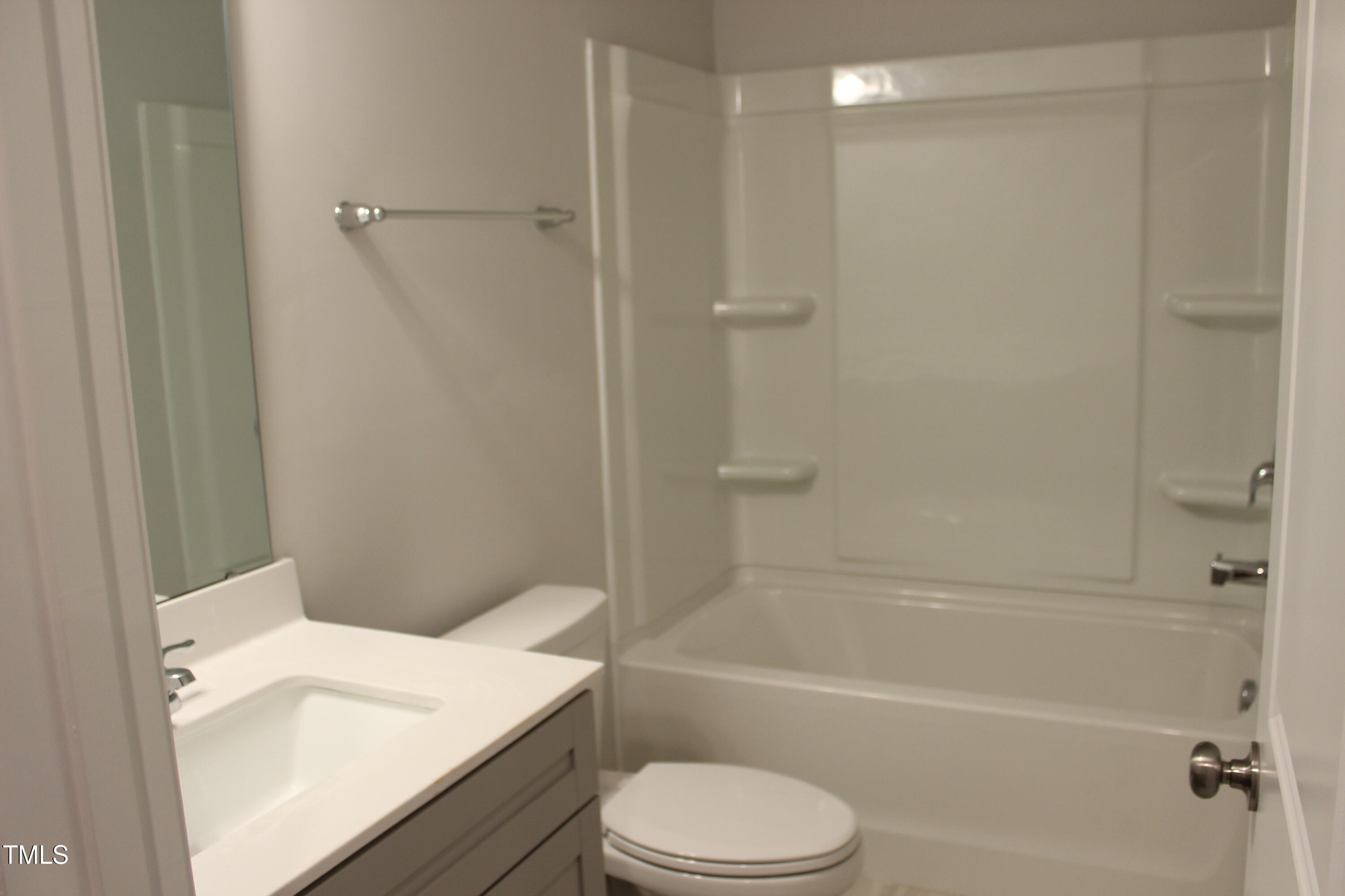 364 Devon Clfs Drive Wake Forest, NC 27587 - Photo 10 of 30 a bathroom with a sink a toilet and a bathtub
