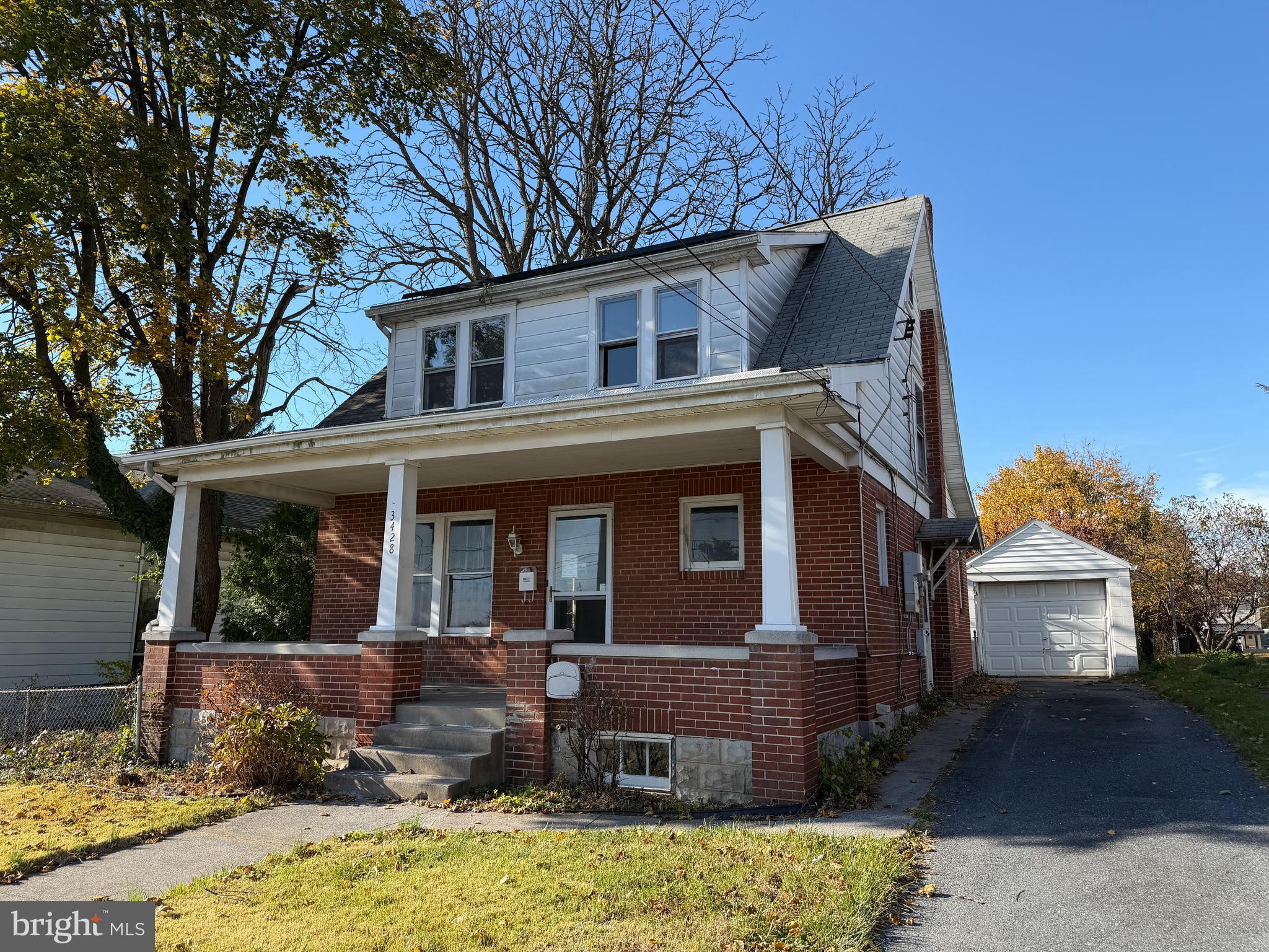 3428 Old Orchard Road Harrisburg, PA 17109 - Photo 1 of 22 a front view of a house with a yard