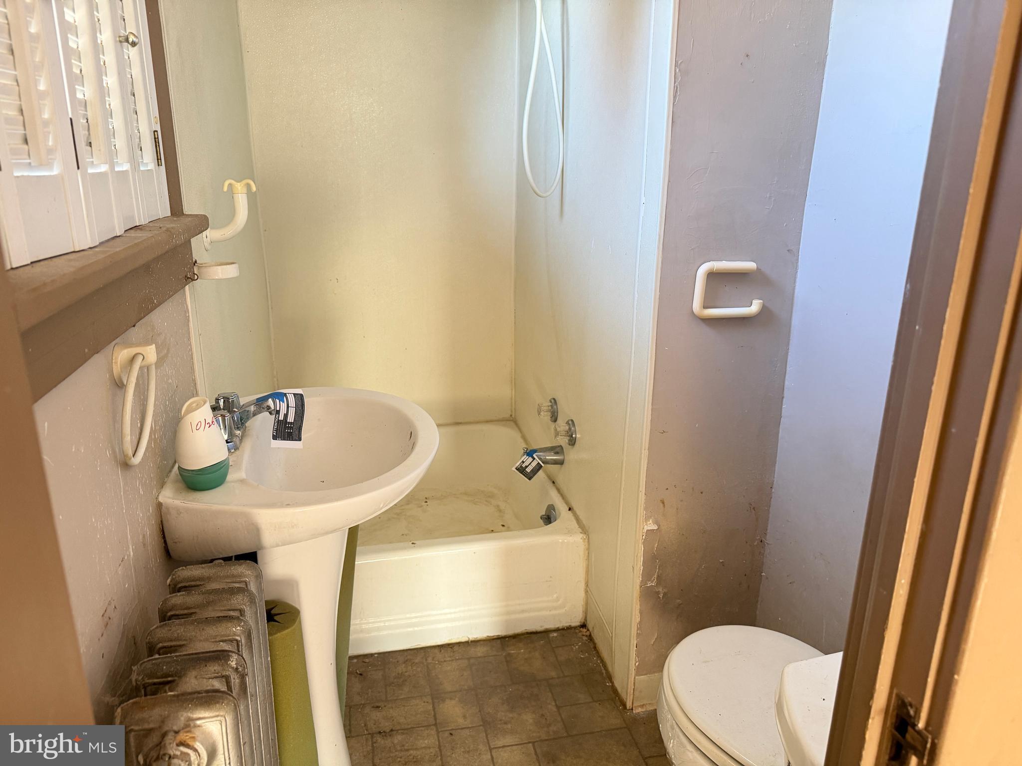 3428 Old Orchard Road Harrisburg, PA 17109 - Photo 13 of 22 a bathroom with a sink a toilet and shower