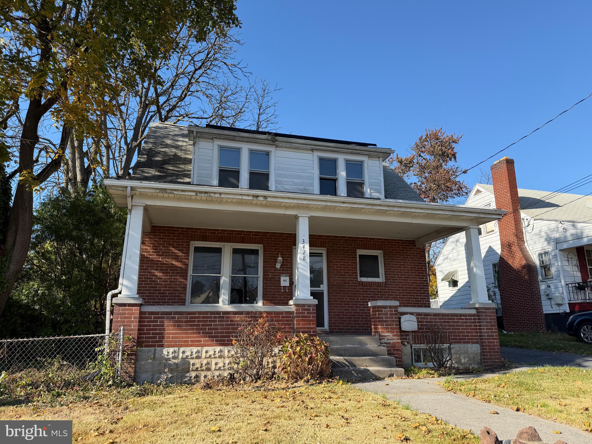 3428 Old Orchard Road Harrisburg, PA 17109 - Photo 2 of 22 a front view of a house with a yard