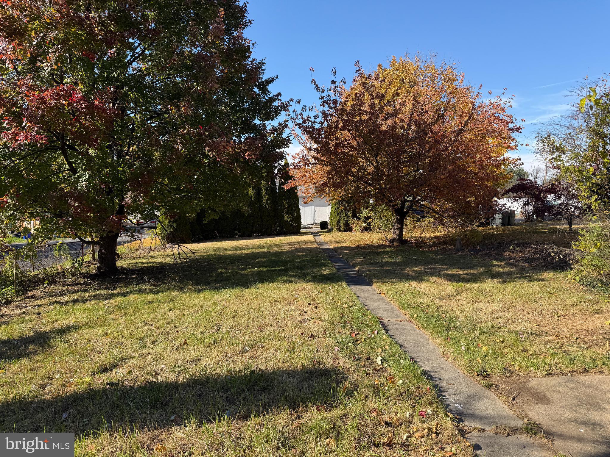 3428 Old Orchard Road Harrisburg, PA 17109 - Photo 5 of 22 a view of a yard with an trees