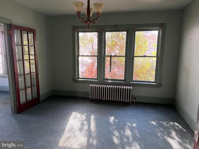 an empty room with windows