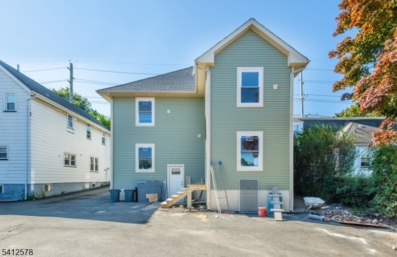 190 East Lindsley Road, Unit 2 Cedar Grove, NJ 07009 - Photo 2 of 2 a front view of a house with a yard