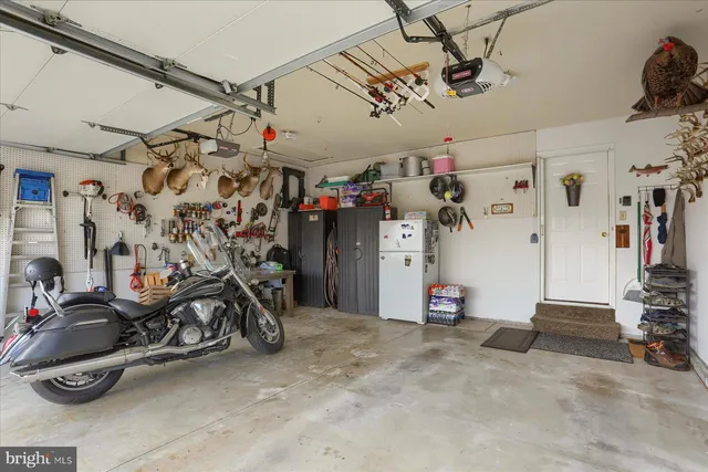 a view of a garage with a bike and wooden roof