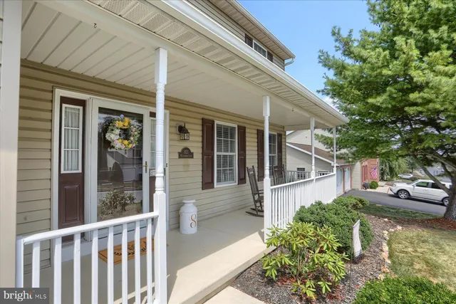 a view of a house with balcony and garden