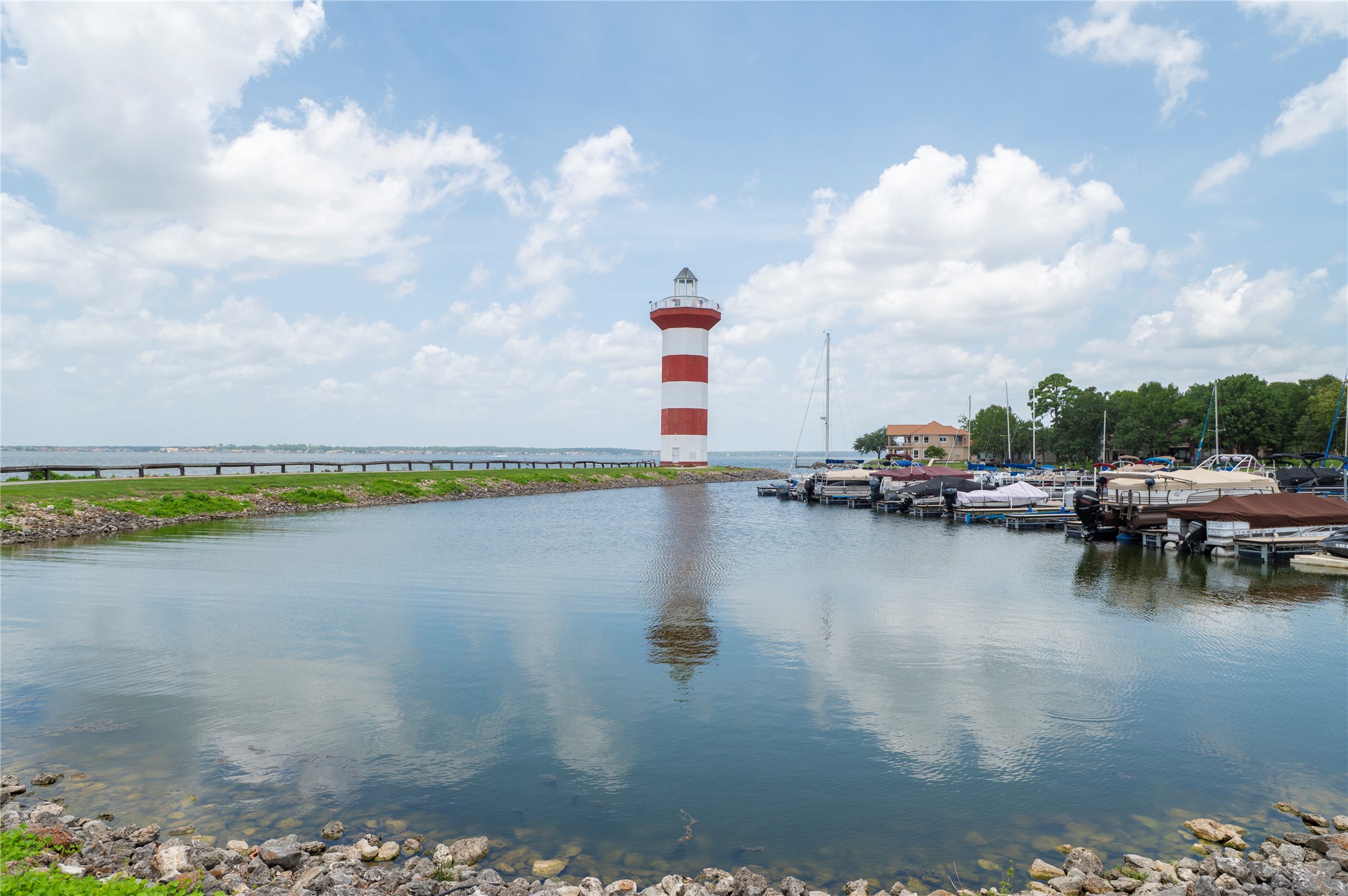 1436 Bowsprit Point Willis, TX 77318 - Photo 12 of 20 a view of a lake with boats