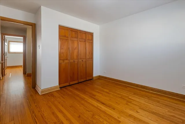 a view of a kitchen with a sink and cabinets