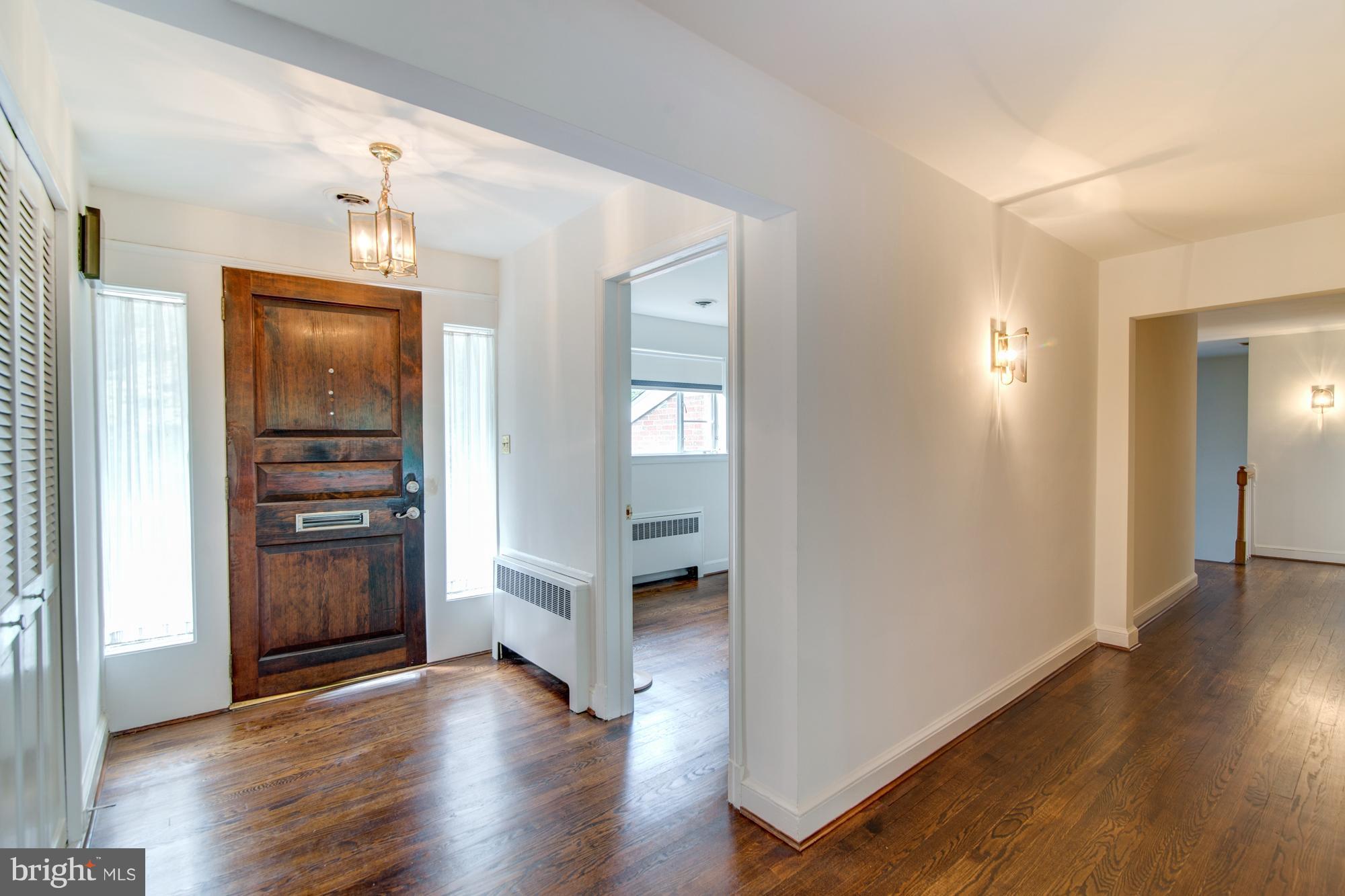 8117 Rayburn Road Bethesda, MD 20817 - Photo 3 of 30 Entrance foyer and den/study