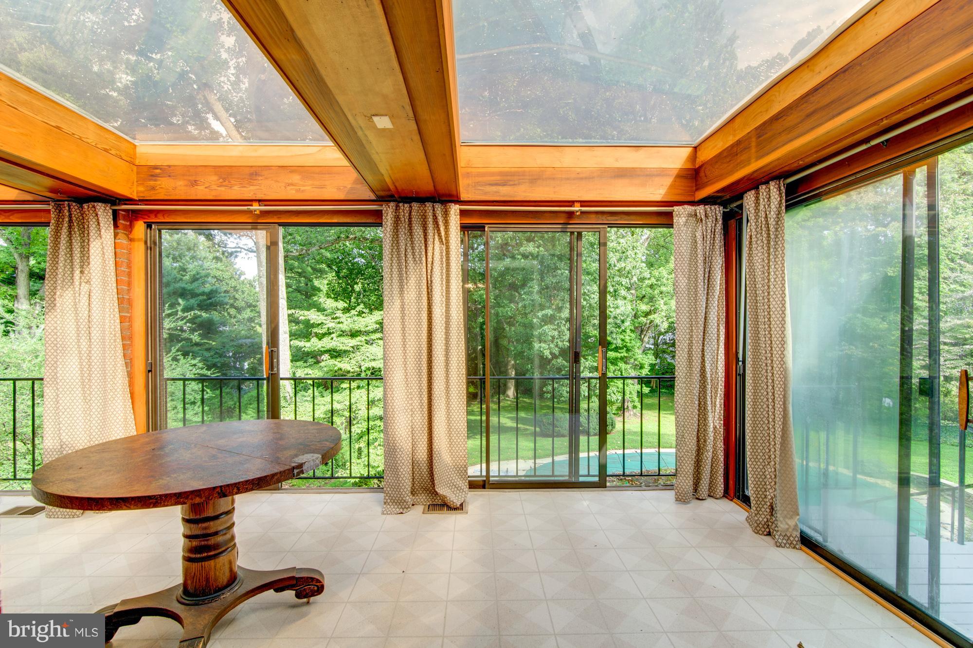 8117 Rayburn Road Bethesda, MD 20817 - Photo 8 of 30 Sunroom with great views