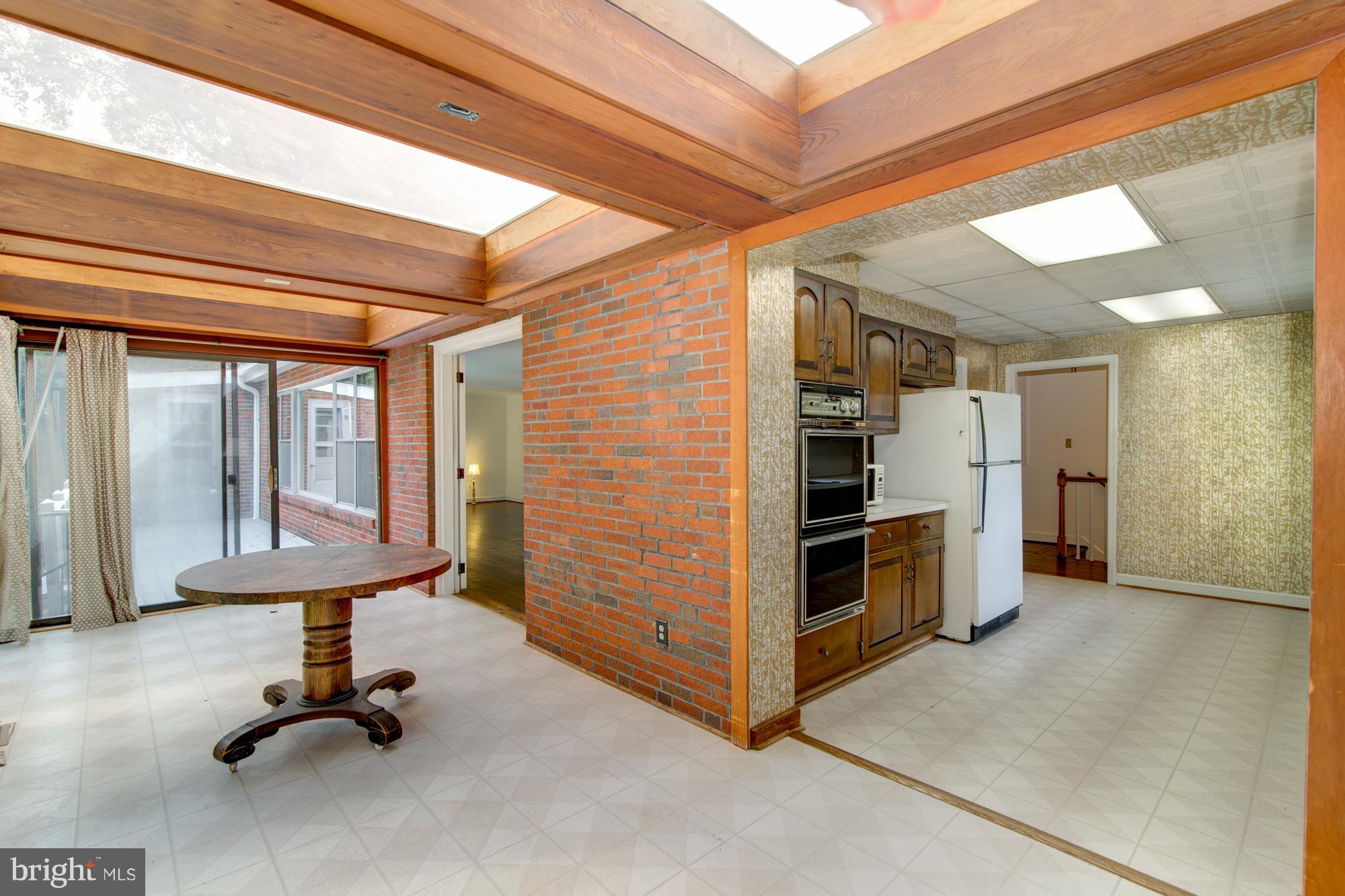 8117 Rayburn Road Bethesda, MD 20817 - Photo 9 of 30 Sunroom with great views and deck
