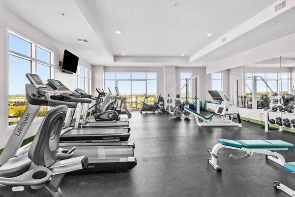 a view of a room with gym equipment