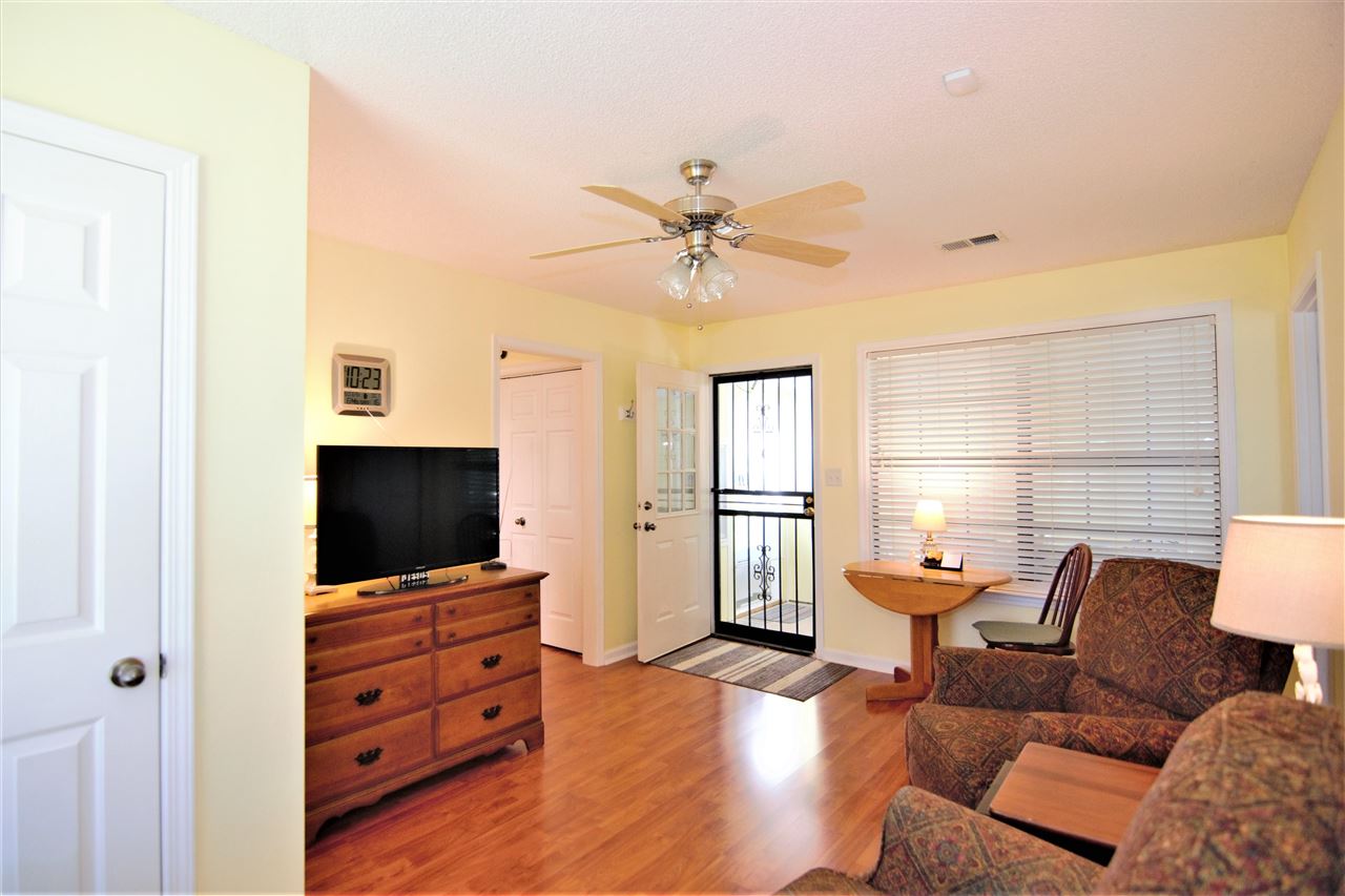 8517 Davidson Road Olive Branch, MS 38654 - Photo 15 of 24 a living room with furniture and a flat screen tv