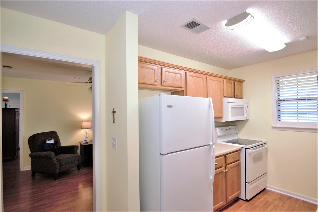8517 Davidson Road Olive Branch, MS 38654 - Photo 16 of 24 a white refrigerator freezer sitting in a kitchen