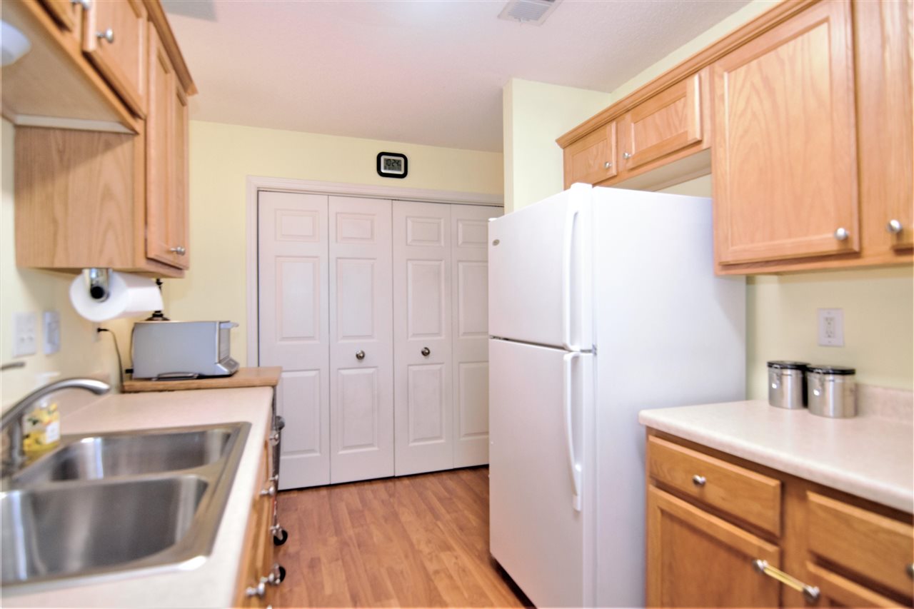 8517 Davidson Road Olive Branch, MS 38654 - Photo 17 of 24 a kitchen with a refrigerator sink and cabinets