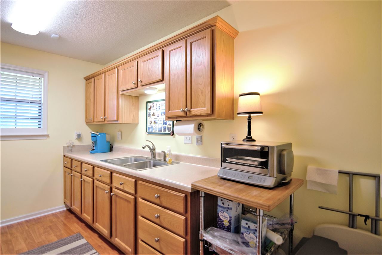 8517 Davidson Road Olive Branch, MS 38654 - Photo 18 of 24 a kitchen with a sink and a window