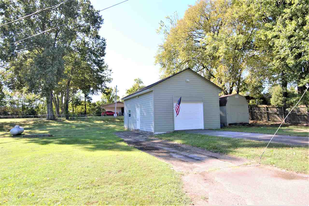 8517 Davidson Road Olive Branch, MS 38654 - Photo 23 of 24 a view of a house with pool and a yard