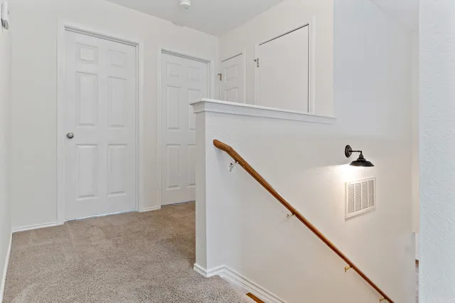 a view of entryway with kitchen