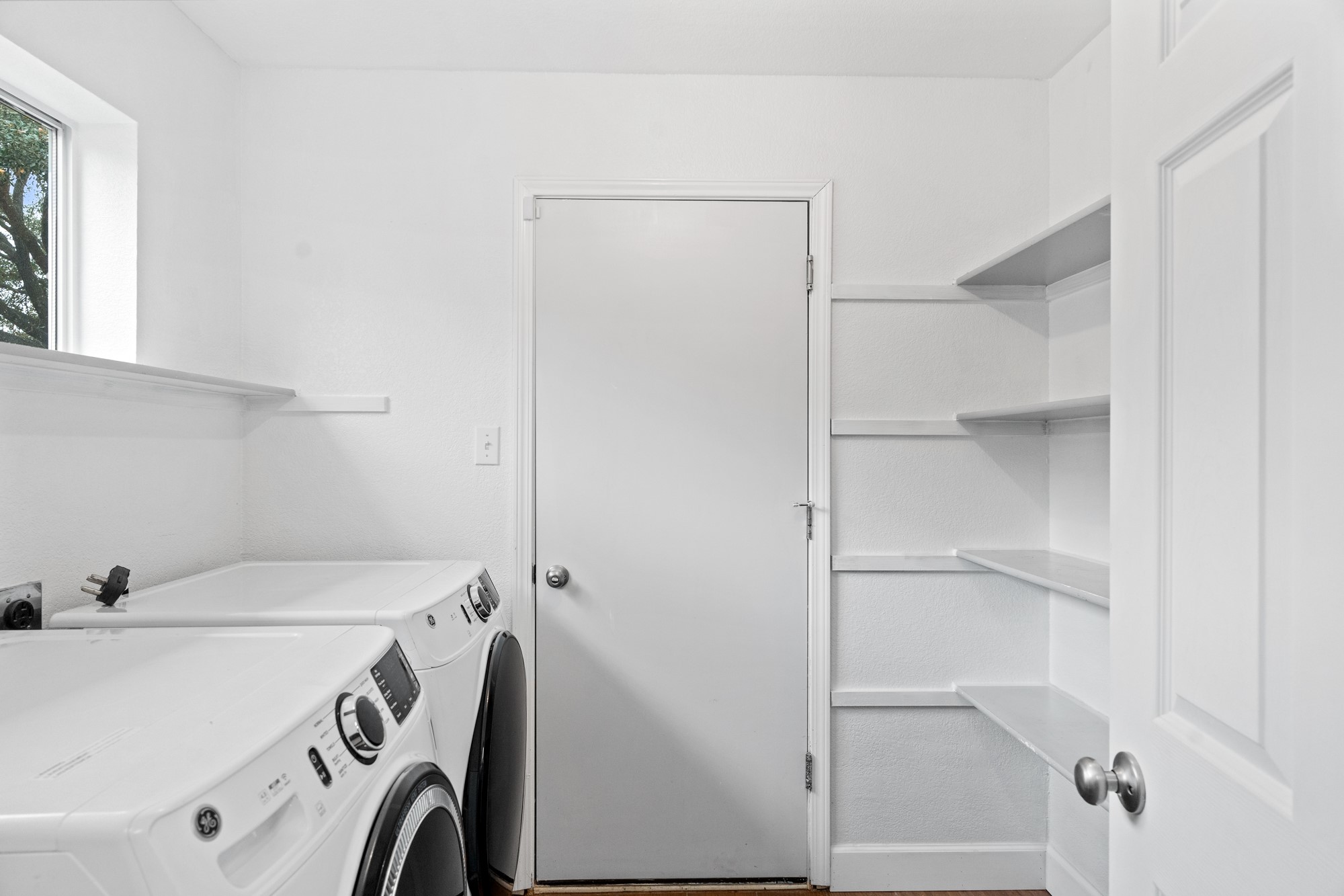 321 Nicole Way Bastrop, TX 78602 - Photo 24 of 32 Laundry room featuring separate washer and dryer