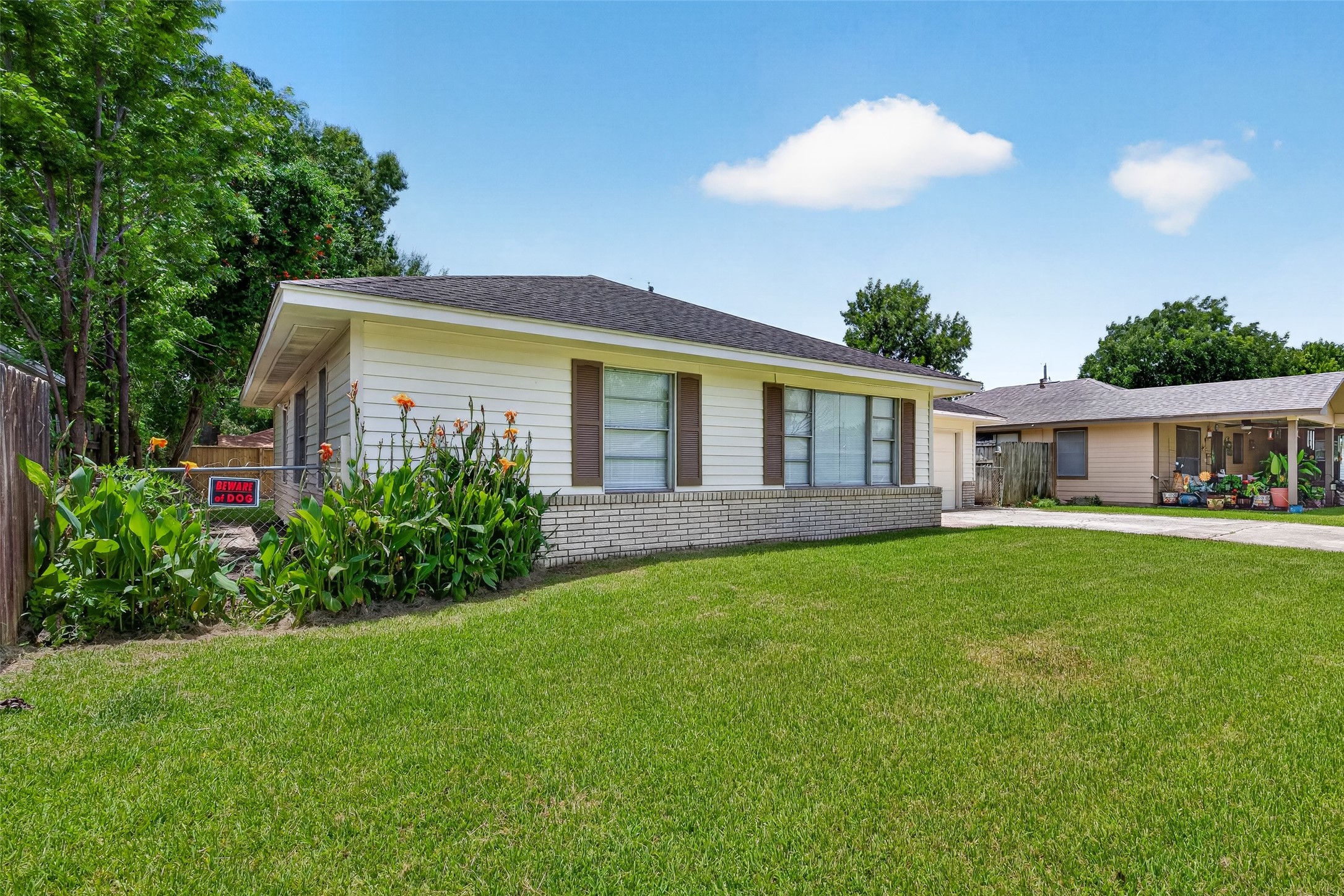 3218 Grant Street Pasadena, TX 77503 - Photo 2 of 26 Nice green space up front, bring your landscaping ideas to life here!