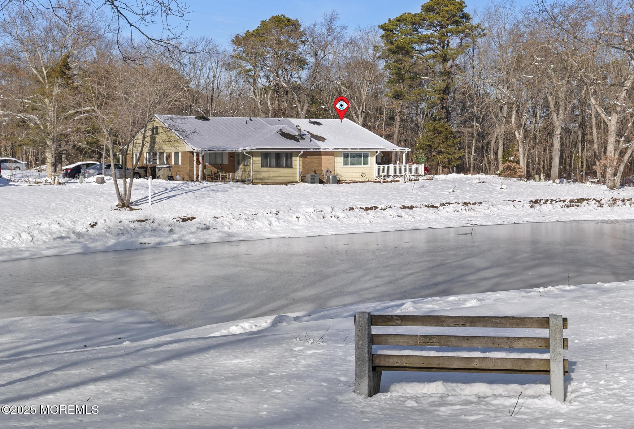6 C Swallow Street Jackson, NJ 08527 - Photo 11 of 12 a front view of a house with a yard