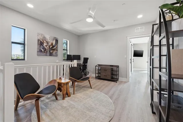 a bedroom with a bed and a walk in closet