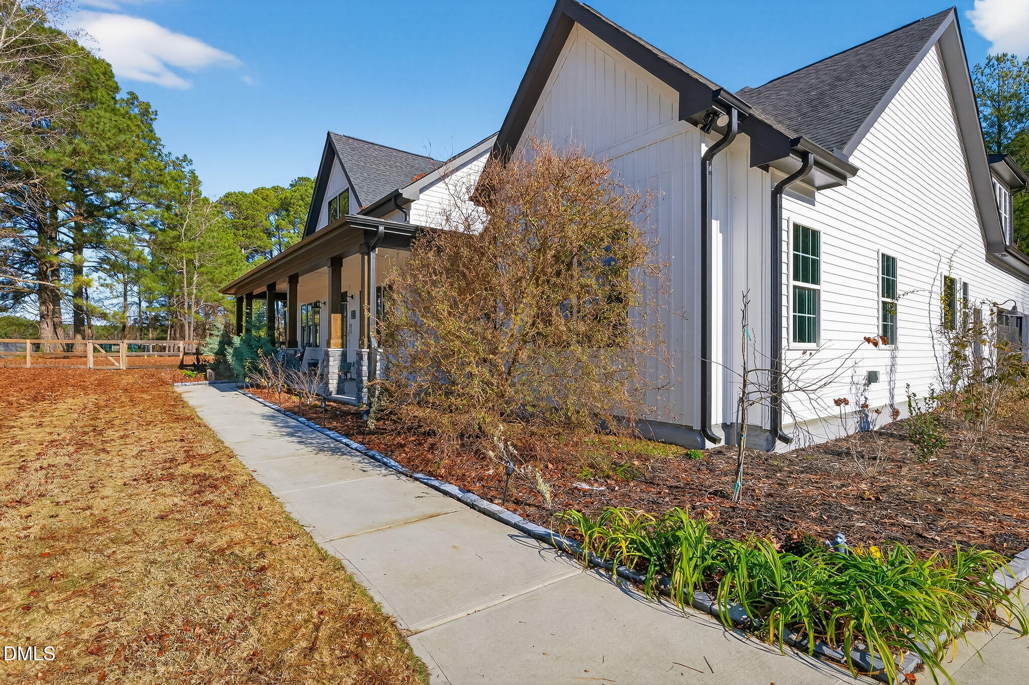 260 Freedom Road Smithfield, NC 27577 - Photo 11 of 75 a view of a house with backyard and trees