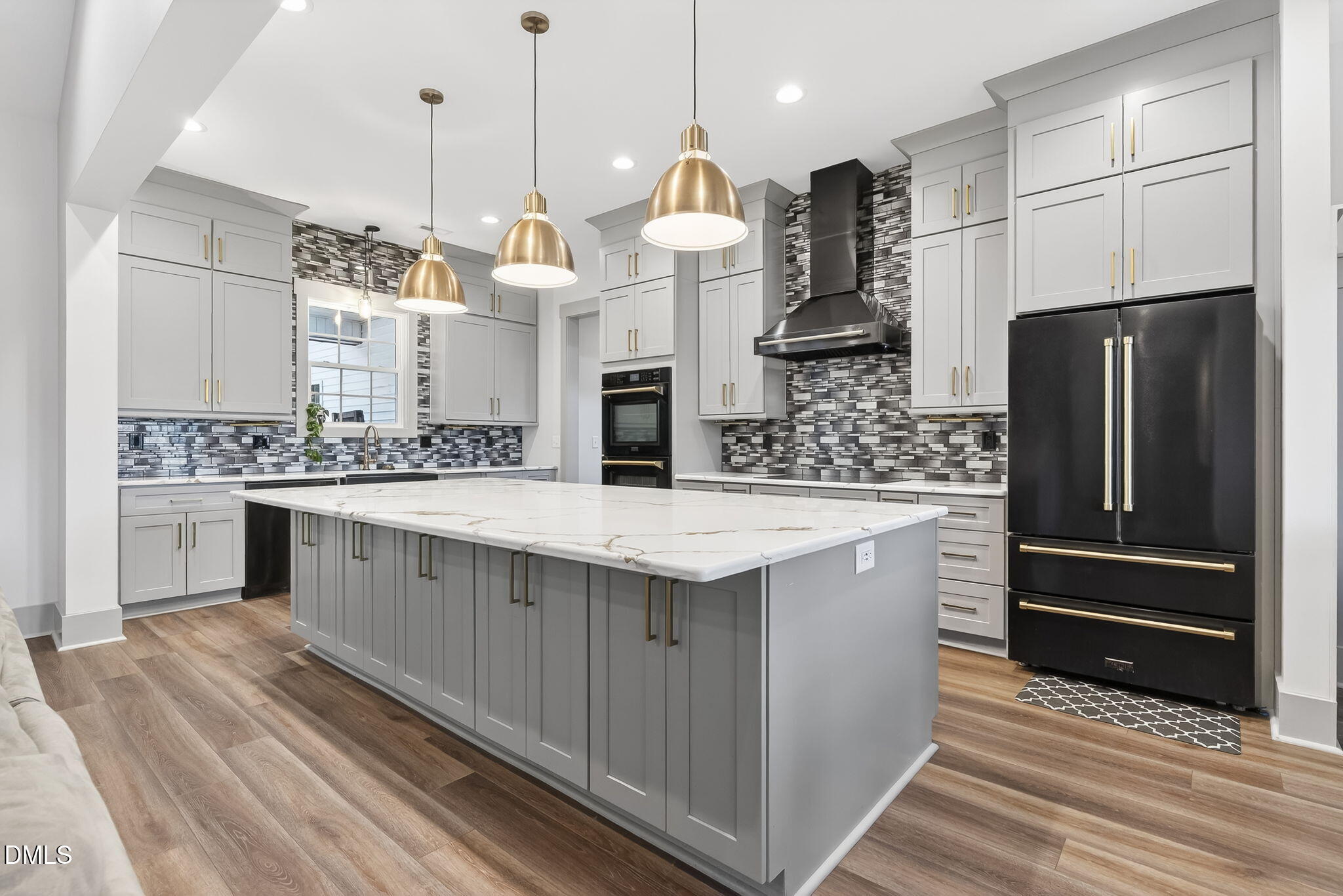 260 Freedom Road Smithfield, NC 27577 - Photo 14 of 75 a kitchen with stainless steel appliances kitchen island granite countertop a sink and a refrigerator