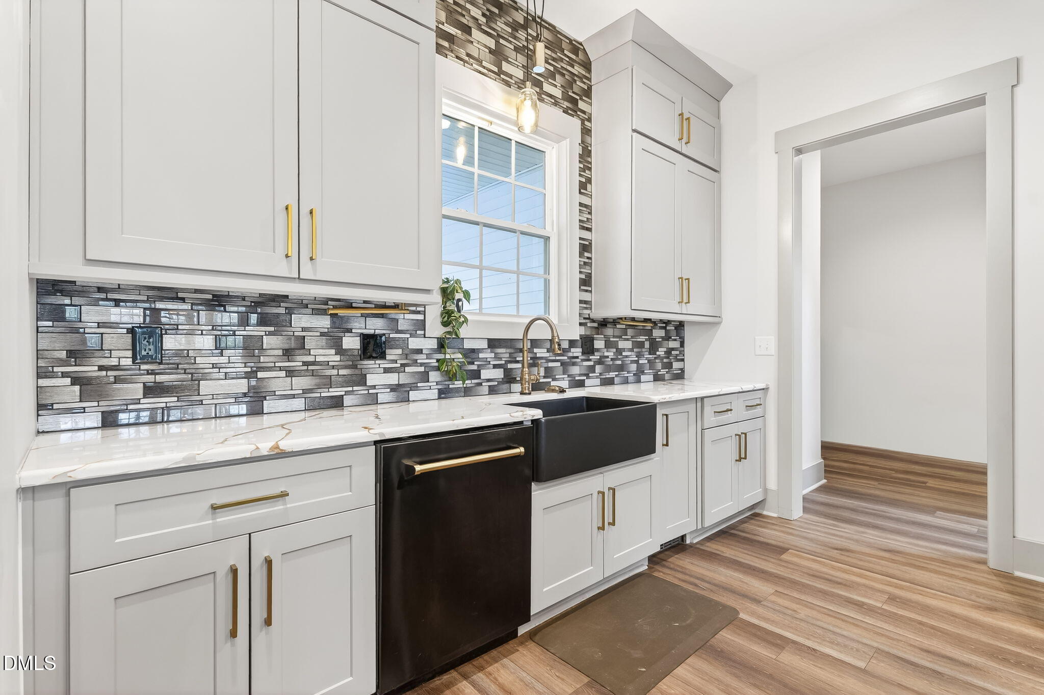 260 Freedom Road Smithfield, NC 27577 - Photo 20 of 75 a kitchen with stainless steel appliances granite countertop a sink and cabinets