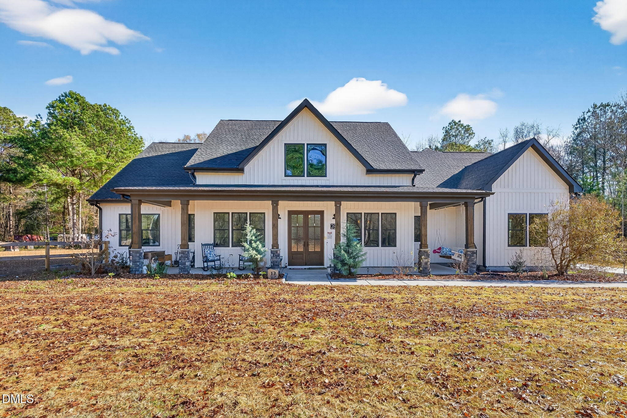 260 Freedom Road Smithfield, NC 27577 - Photo 2 of 75 a front view of house with yard outdoor seating and green space