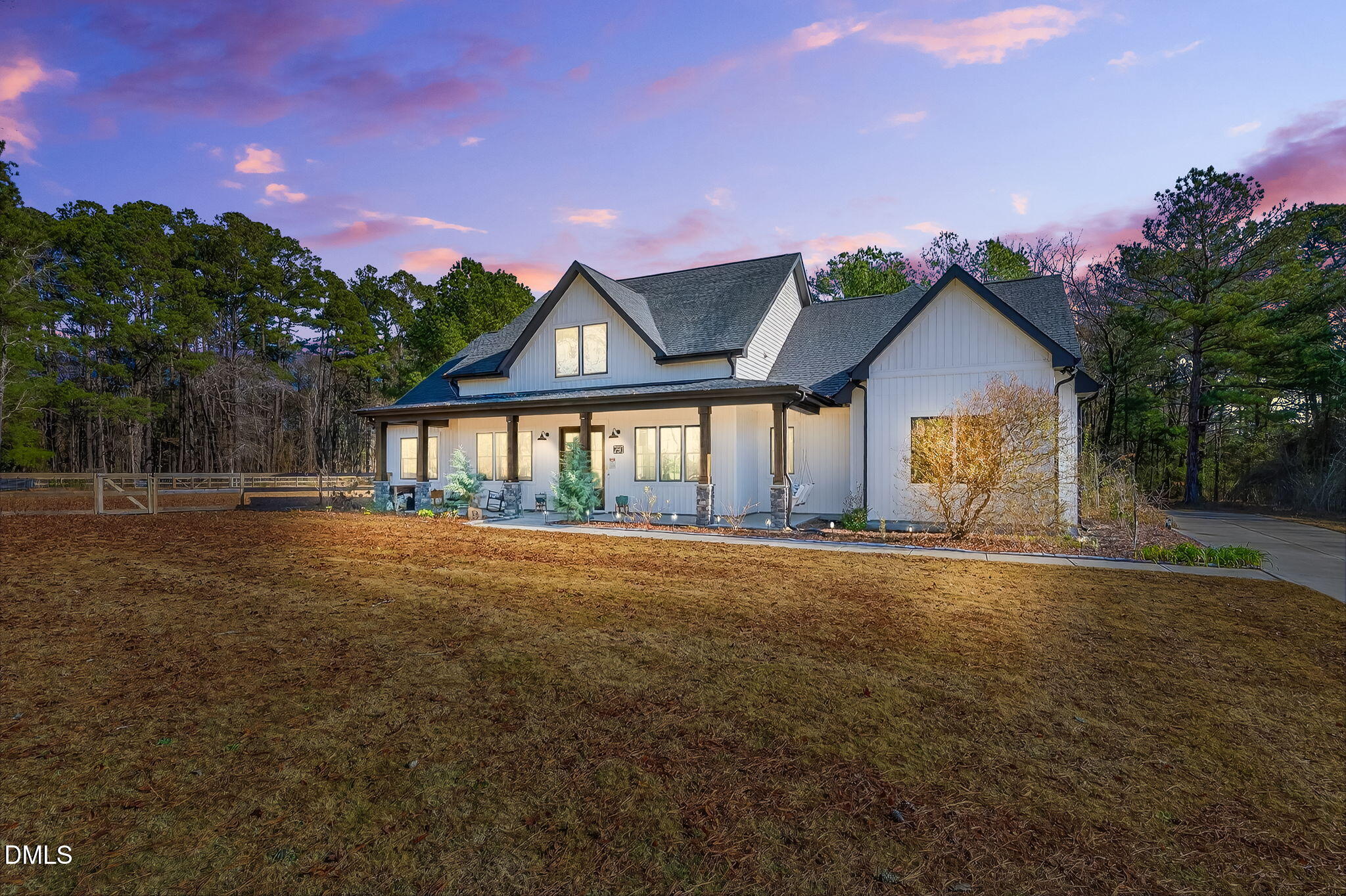 260 Freedom Road Smithfield, NC 27577 - Photo 2 of 75 a front view of a house with a garden and yard