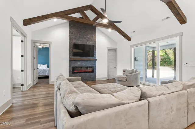 a view of livingroom with hardwood floor and a ceiling fan