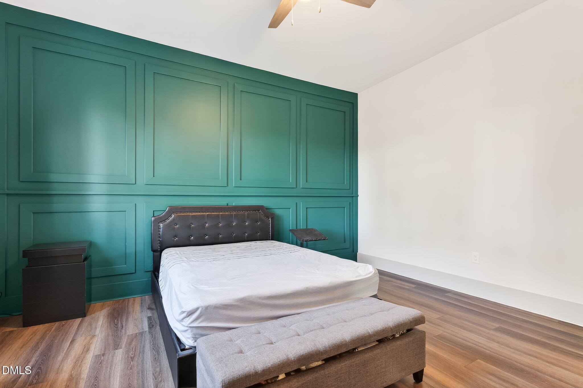 260 Freedom Road Smithfield, NC 27577 - Photo 38 of 75 a bedroom with a bed and a dresser