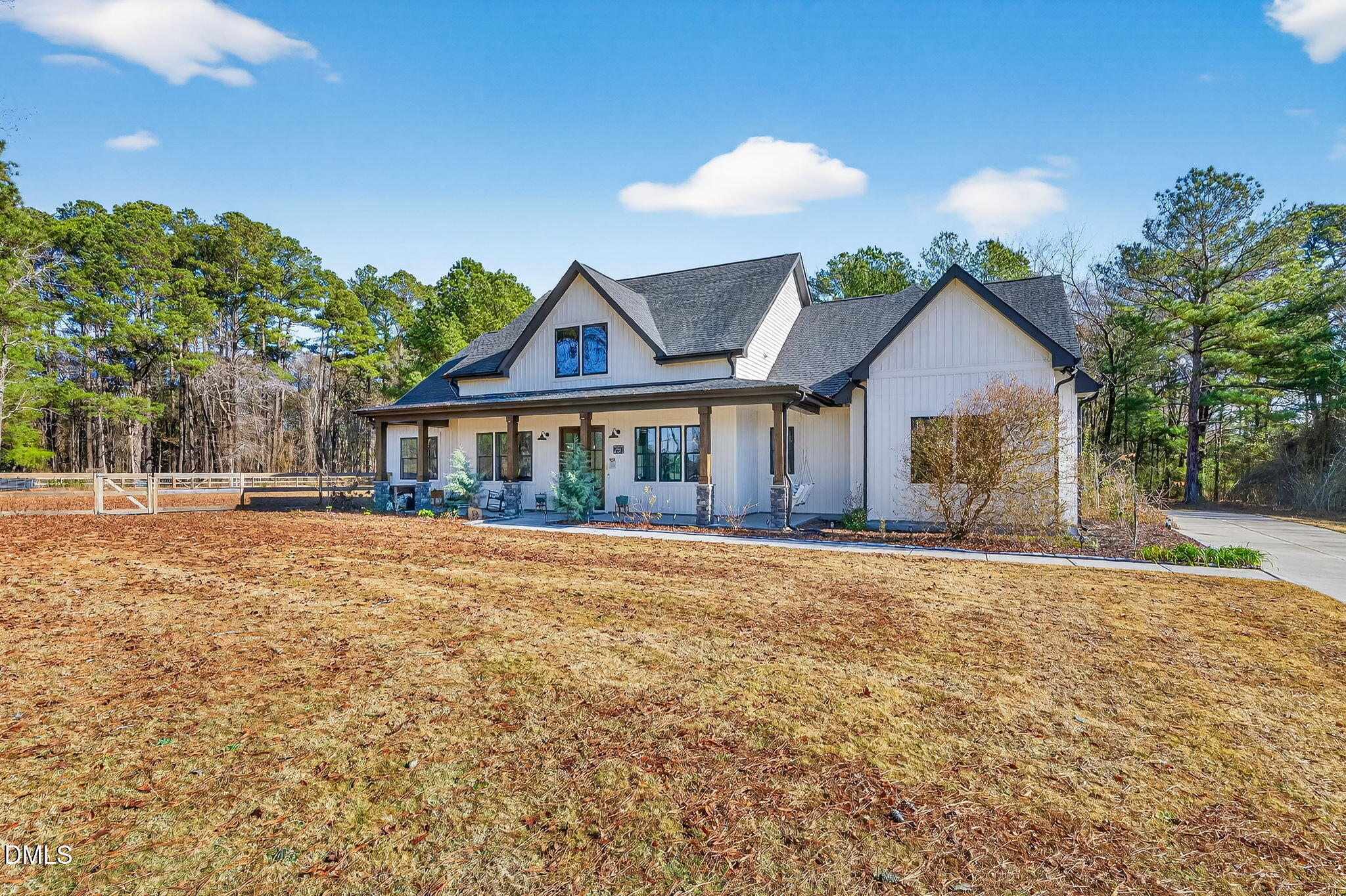 260 Freedom Road Smithfield, NC 27577 - Photo 4 of 75 a front view of a house with a garden