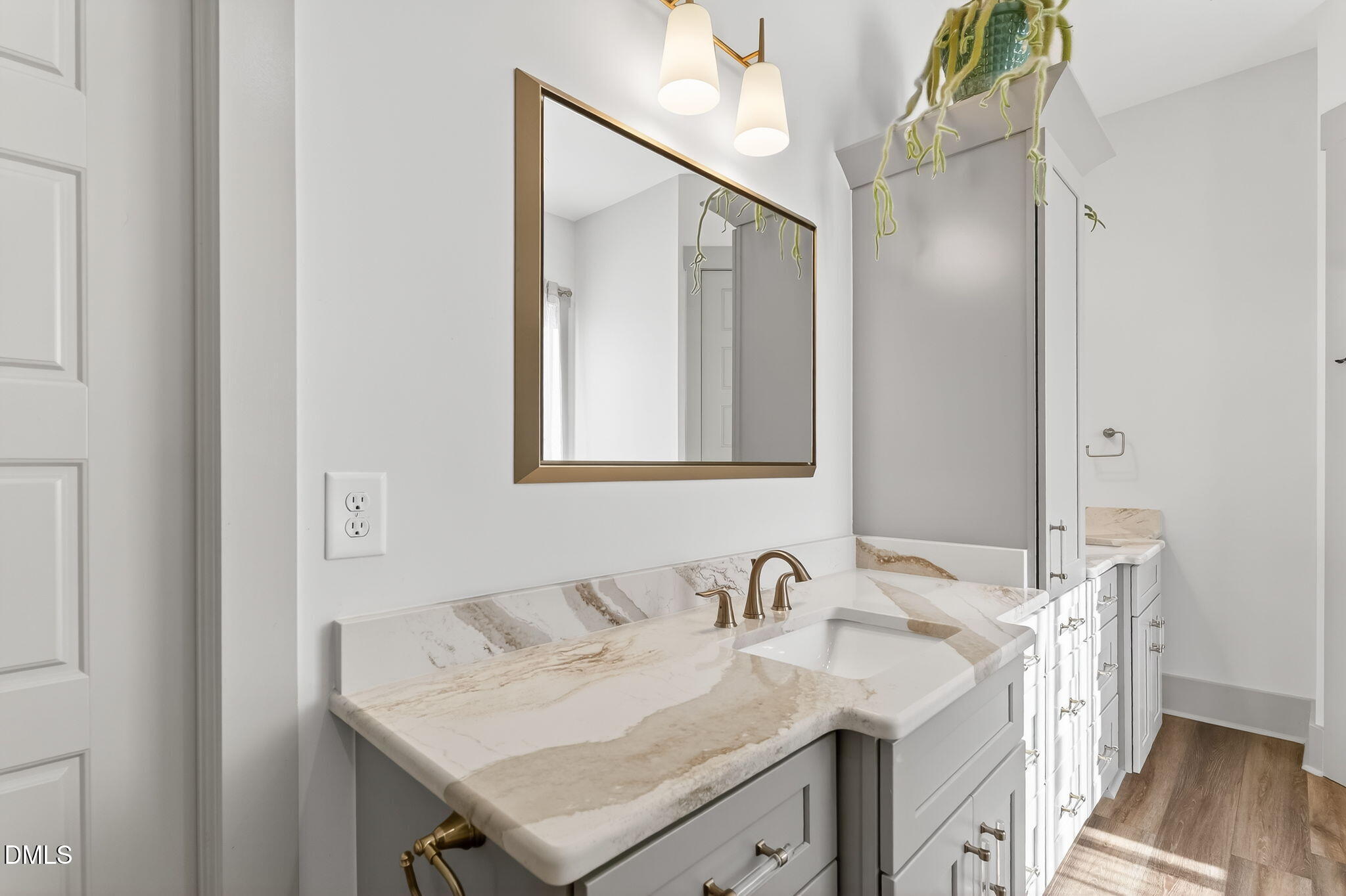 260 Freedom Road Smithfield, NC 27577 - Photo 42 of 75 a bathroom with a sink vanity and a mirror
