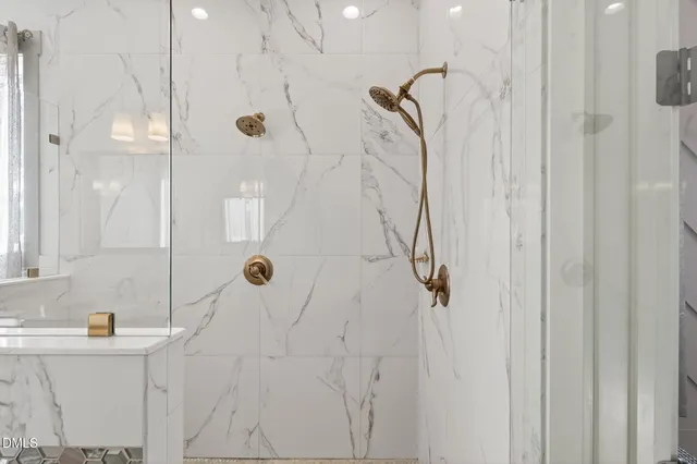 a view of a house with backyard and trees