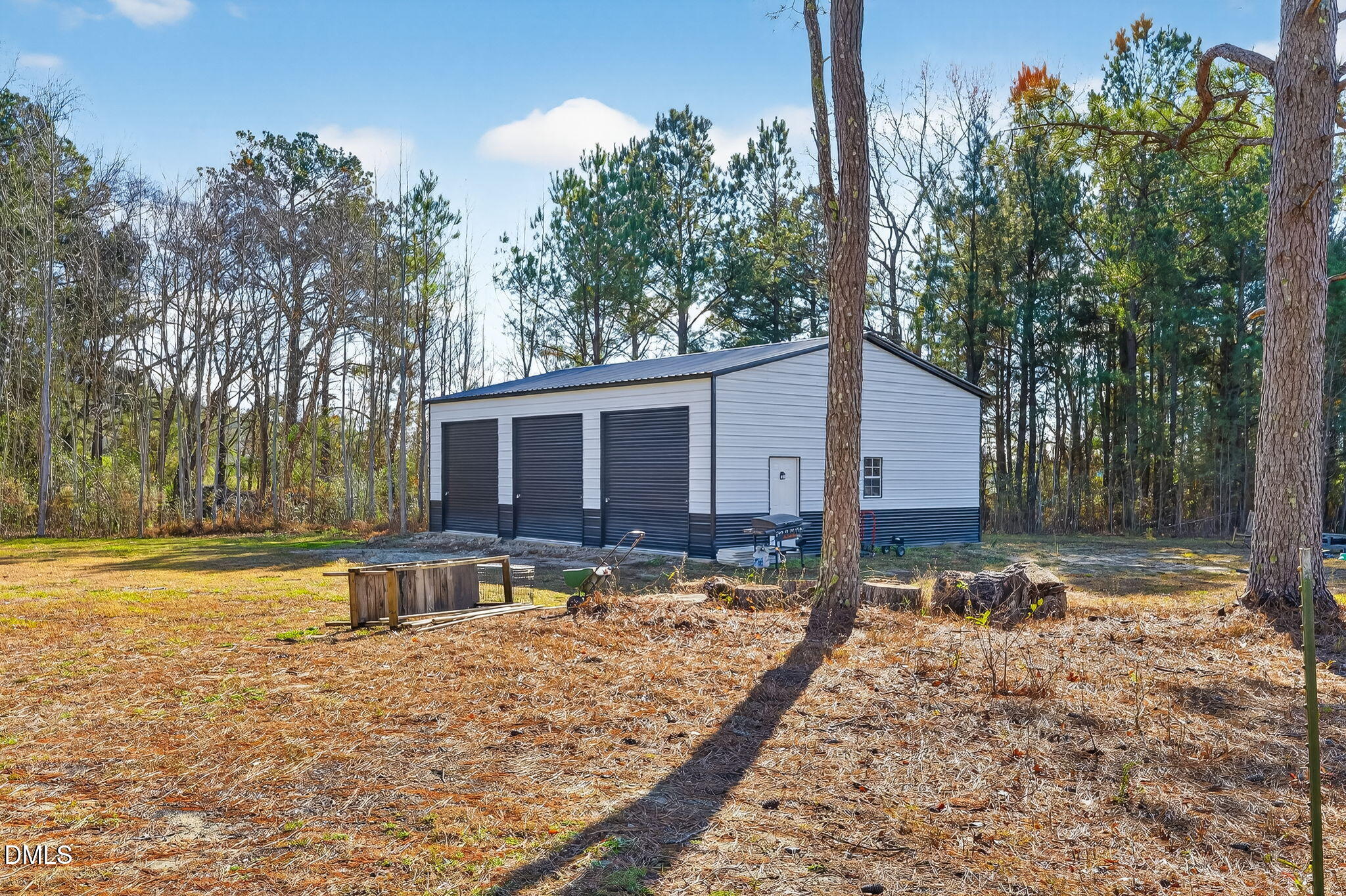 260 Freedom Road Smithfield, NC 27577 - Photo 61 of 75 a view of a house with backyard and trees