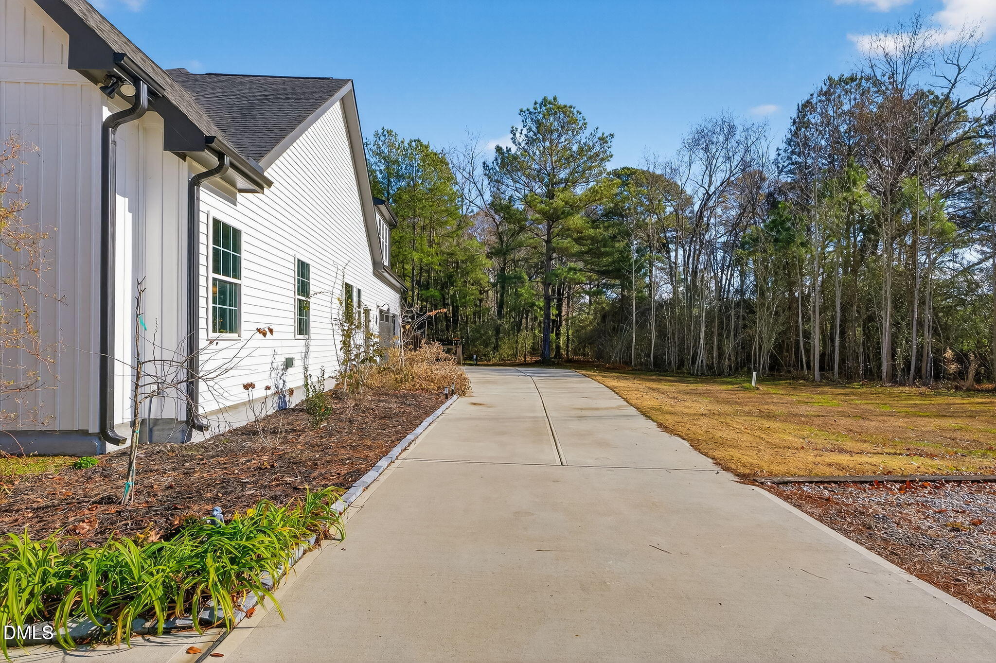 260 Freedom Road Smithfield, NC 27577 - Photo 10 of 75 a house with garden in front of it