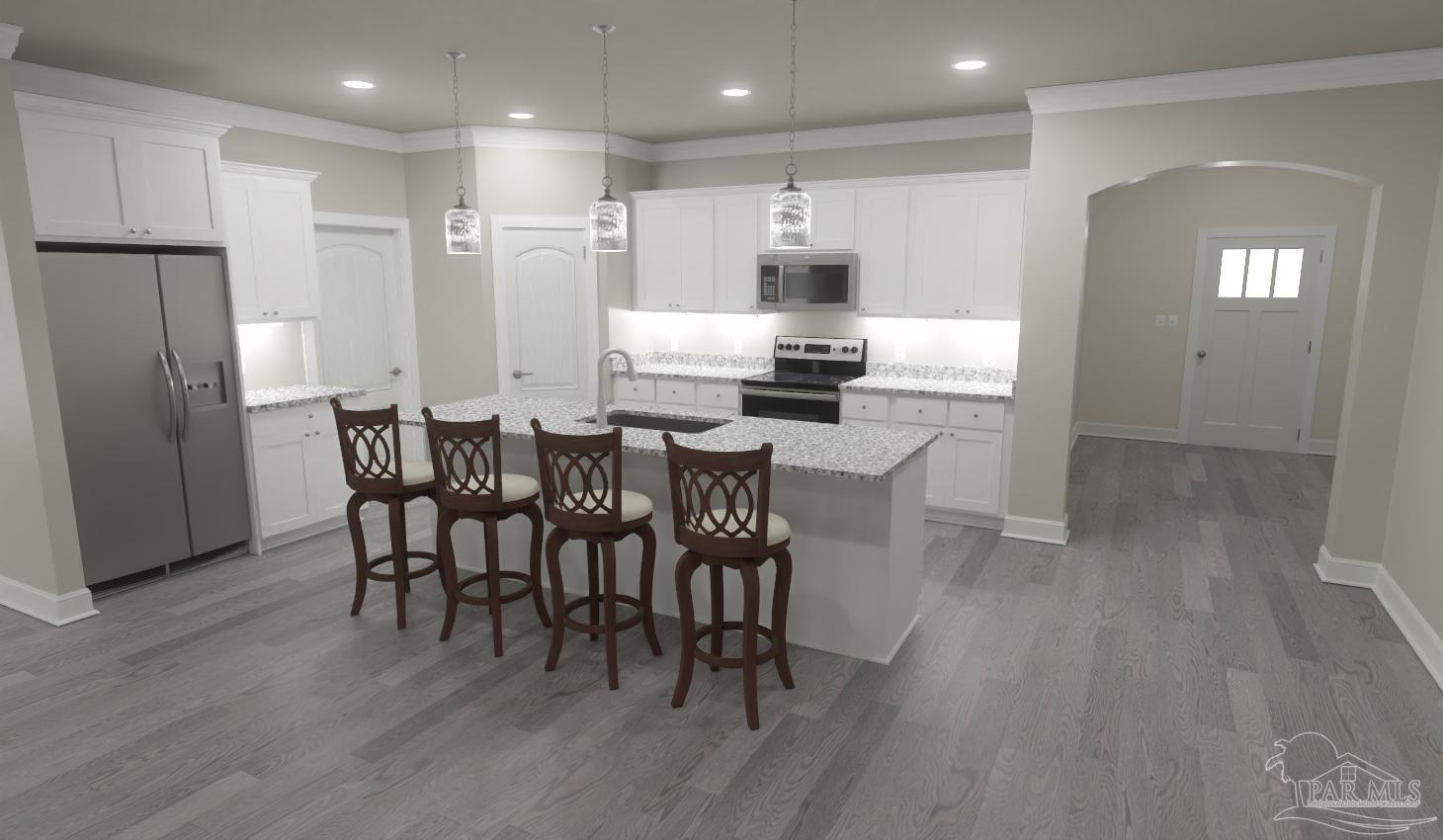 4835 Horace Lunsford Road Milton, FL 32570 - Photo 7 of 20 a large kitchen with a table and chairs