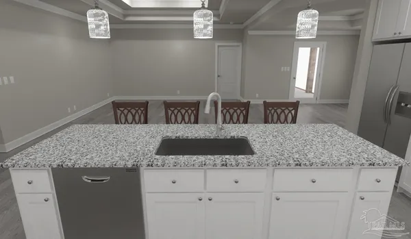 a bathroom with a granite countertop sink a mirror and vanity