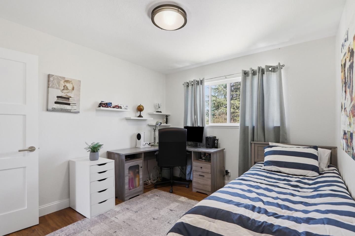 5888 Lean Way San Jose, CA 95123 - Photo 37 of 54 a bedroom with a bed and a window