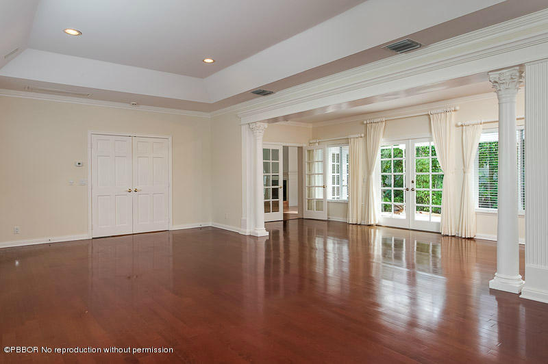 275 North County Road Palm Beach, FL 33480 - Photo 2 of 15 a view of an empty room with wooden floor and a window