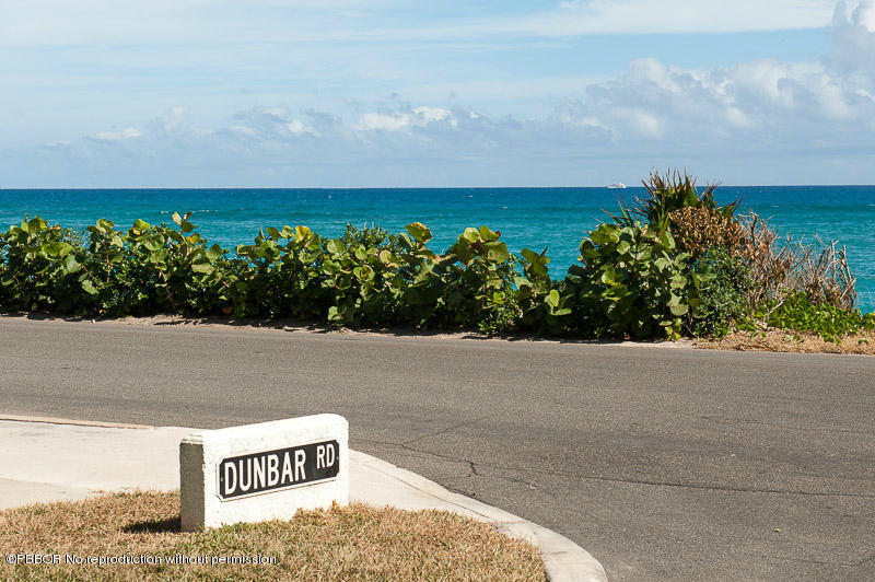 275 North County Road Palm Beach, FL 33480 - Photo 13 of 15 a view of a yard with an ocean view