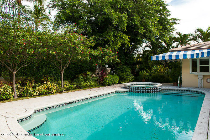 275 North County Road Palm Beach, FL 33480 - Photo 3 of 15 a view of a swimming pool with a patio