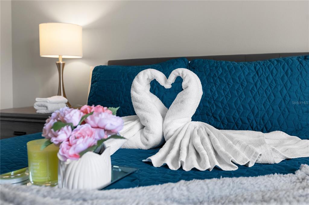 8558 Crystal Cove Loop Kissimmee, FL 34747 - Photo 22 of 35 a bathroom with a sink mirror and tub