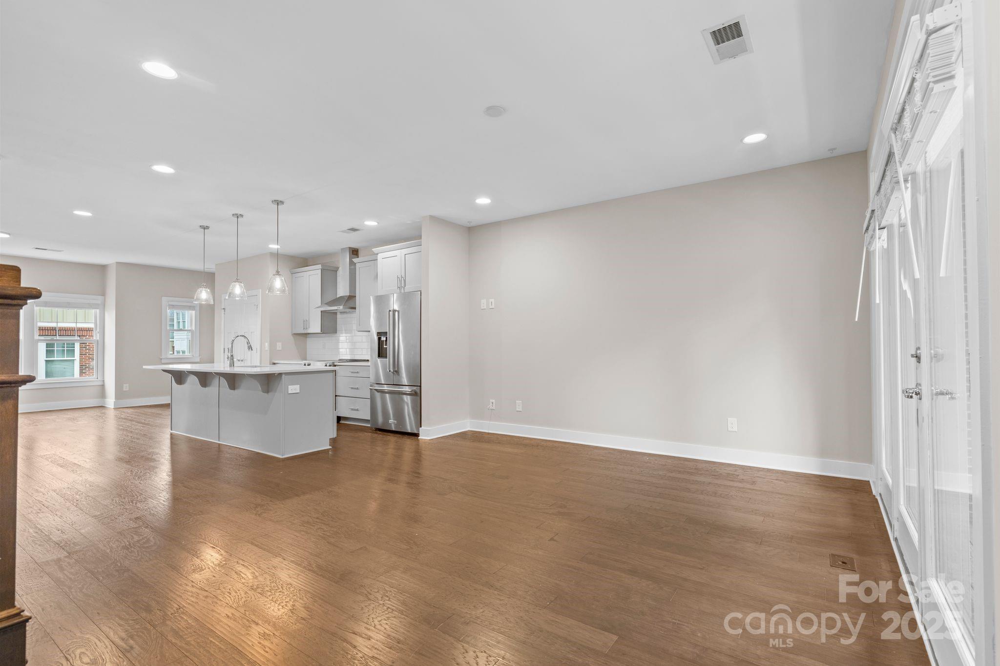 129 Grandin Road Charlotte, NC 28208 - Photo 17 of 35 a view of kitchen with kitchen island and stainless steel appliances