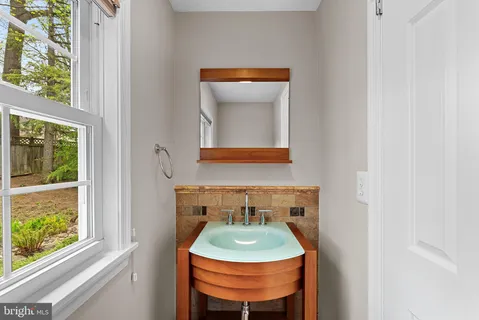a room with a table and a window