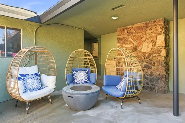 a view of a swimming pool with a patio