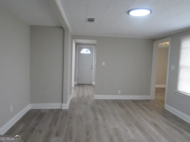 an empty room with windows