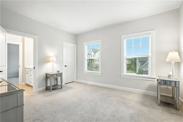 a big room with windows and closet