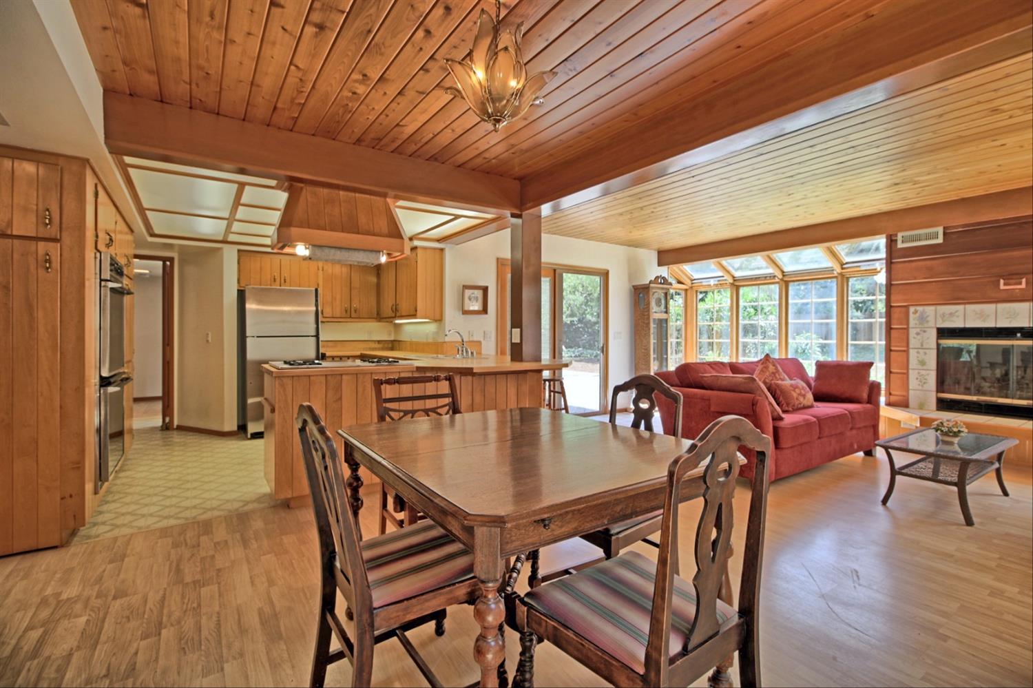 205 Palomar Road Ojai, CA 93023 - Photo 13 of 38 a view of a dining room with furniture window and wooden floor